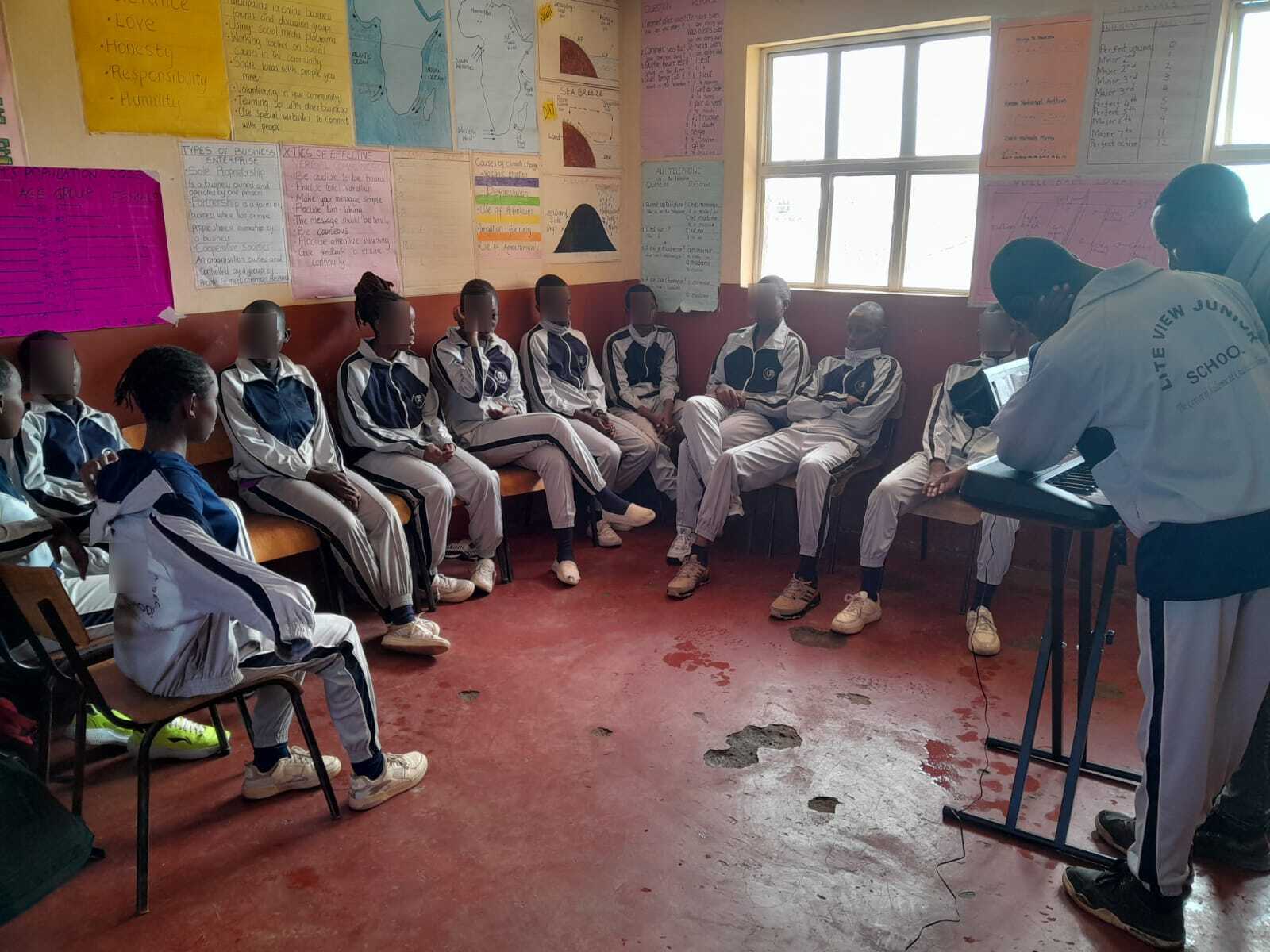 Music class with students learning instruments and vocals